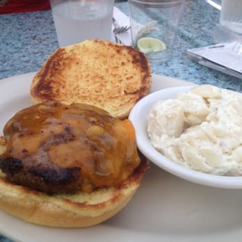 The Adams Pub - My burger initially came with nothing on it overcooked. I had to ask for lettuce and tomato which was a bug burden for them. - American Near Me - Quincy, Massachusetts