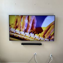 Aftermath General Services - Mounted an LG TV along with a slim LG soundbar.  Low voltage cables are behind the wall and a new outlet installed behind the TV via kit.