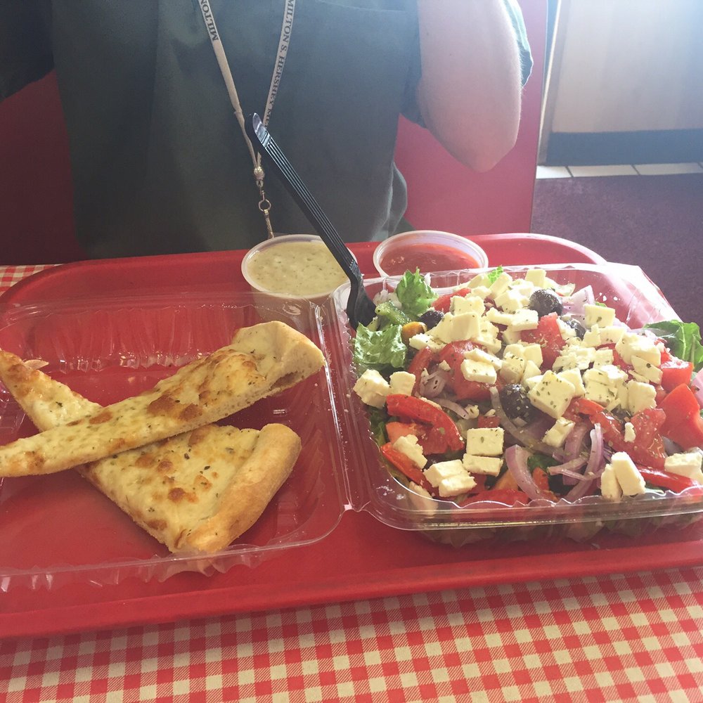 Tonino's Pizza - Greek salad served with their pizza bread - Pizza Near Me - Harrisburg, Pennsylvania Tonino's Pizza - Greek salad served with their pizza bread - Pizza Near Me - Harrisburg, Pennsylvania