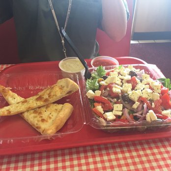 Tonino's Pizza - Greek salad served with their pizza bread - Pizza Near Me - Harrisburg, Pennsylvania Tonino's Pizza - Greek salad served with their pizza bread - Pizza Near Me - Harrisburg, Pennsylvania