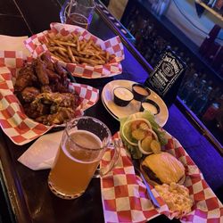 Bucketz Bar N Grill - Basket of fries, wings, and the cheeseburger
