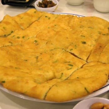Dumpling Kitchen - #13 Shanghai-style green onion pancake (texture is doughy like bread) - Chinese Near Me - San Francisco, California Dumpling Kitchen - #13 Shanghai-style green onion pancake (texture is doughy like bread) - Chinese Near Me - San Francisco, California