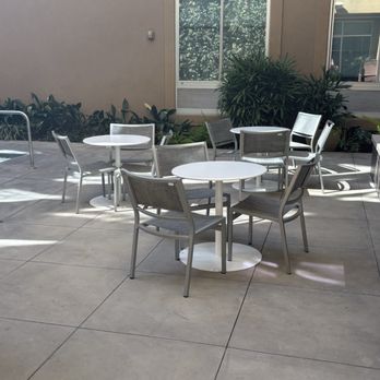 Hyatt Place Riverside/Downtown - Pool area tables - Hotels Near Me - Riverside, California