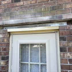 Affordable Brick Repair - Brick cut out, old rusted lintel removed and new lintel in place ready for brick snd mortar.