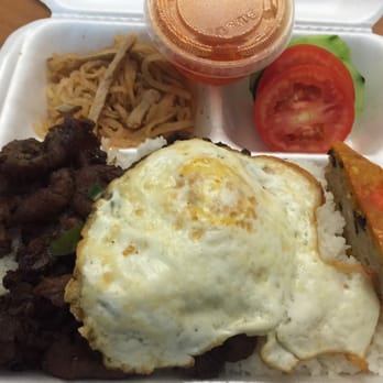 Hoang My - E6 - charbroiled pork, shredded pork, egg cake, and fried egg over crushed rice. - Vietnamese Near Me - Houston, Texas Hoang My - E6 - charbroiled pork, shredded pork, egg cake, and fried egg over crushed rice. - Vietnamese Near Me - Houston, Texas