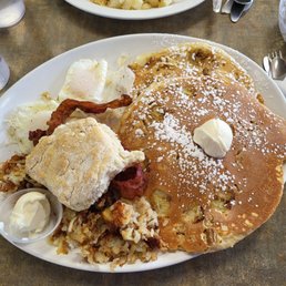 The "Biggy" with 2 HUGE Banana Nut Pancakes, Shredded Hash Browns, 2 Eggs, Bacon, & a biscuit. Sooo good & very filling! The "Biggy" with 2 HUGE Banana Nut Pancakes, Shredded Hash Browns, 2 Eggs, Bacon, & a biscuit. Sooo good & very filling!
