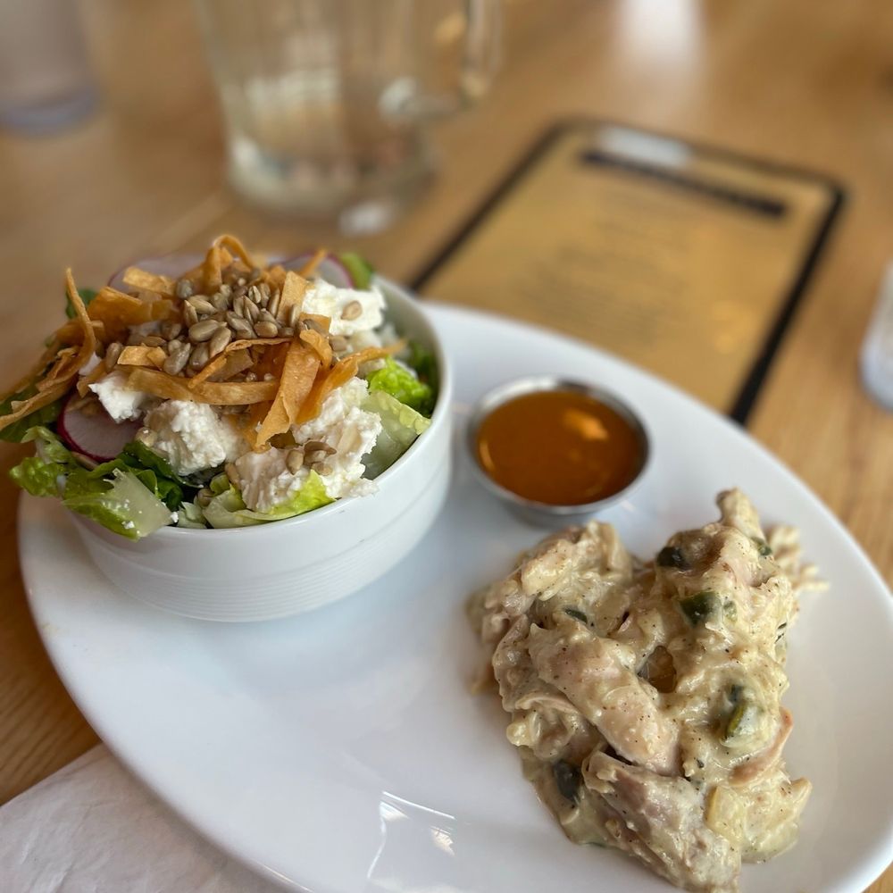 Brasa - a plate of food on a table - Southern Near Me - Minneapolis, Minnesota Brasa - a plate of food on a table - Southern Near Me - Minneapolis, Minnesota