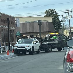 Classic Towing - Danny was able to maneuver the car off the curb!