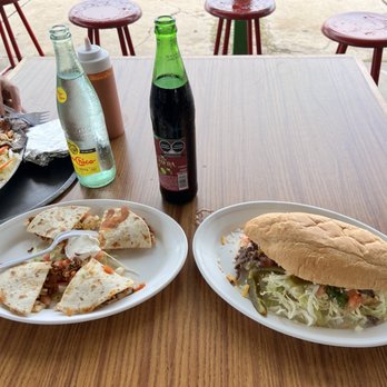 Tacos Yo Soy - Gringa de pastor (left) Torta de la Casa torta rica (right) - Mexican Near Me - Smithville, Texas