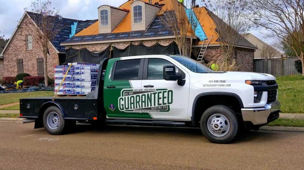 Slide of Guaranteed Roofing Company
