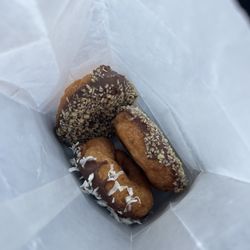 Doughboys Donut - Chocolate, coconut and chocolate, toasted, coconut, or crunchy... both great!