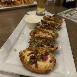 Fletcher's Pub - Loaded potatoes skin