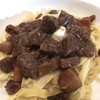 Mi Piace - Prime Beef Bourguignon with Heirloom baby carrots, Cremini mushrooms, and Cipollini onion, served over fresh handmade fettuccine. - Italian Near Me - Pasadena, California Mi Piace - Prime Beef Bourguignon with Heirloom baby carrots, Cremini mushrooms, and Cipollini onion, served over fresh handmade fettuccine. - Italian Near Me - Pasadena, California