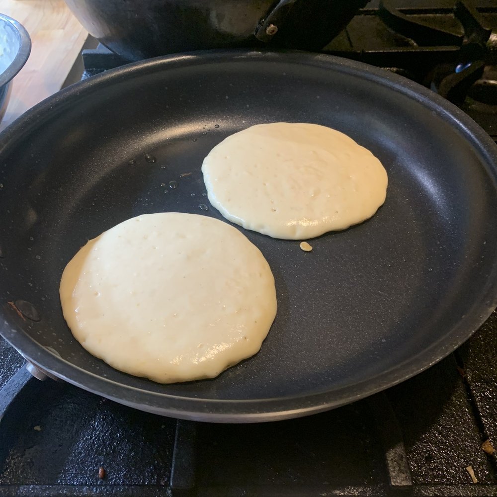 orange ricotta pancakes in the making