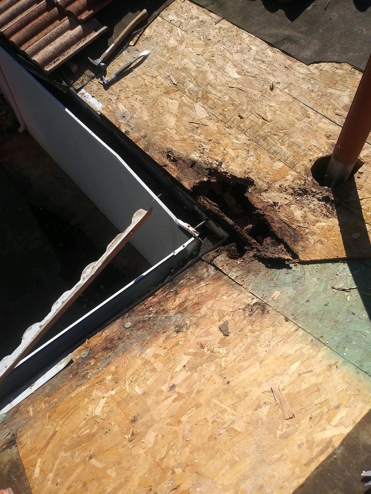 Slide of Father And Son Roofing.