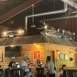 Smokey's Grille - Love the decoration--including cars over the restrooms.