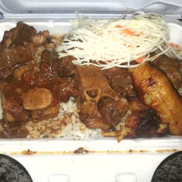 oxtail with rice and peas, coleslaw and plantain $12