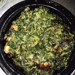 Precious Kitchen - Fried Potatoe Greens served with white rice... very very good.... spicey