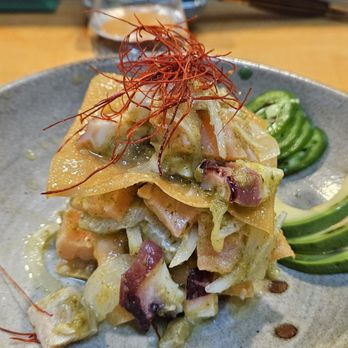 Sushi Bei - Agua Chile Mixto: Mélange of chopped salmon, halibutt, octopus tossed in a citrus, cilantro, greenish dressing - Sushi Bars Near Me - Gardena, California