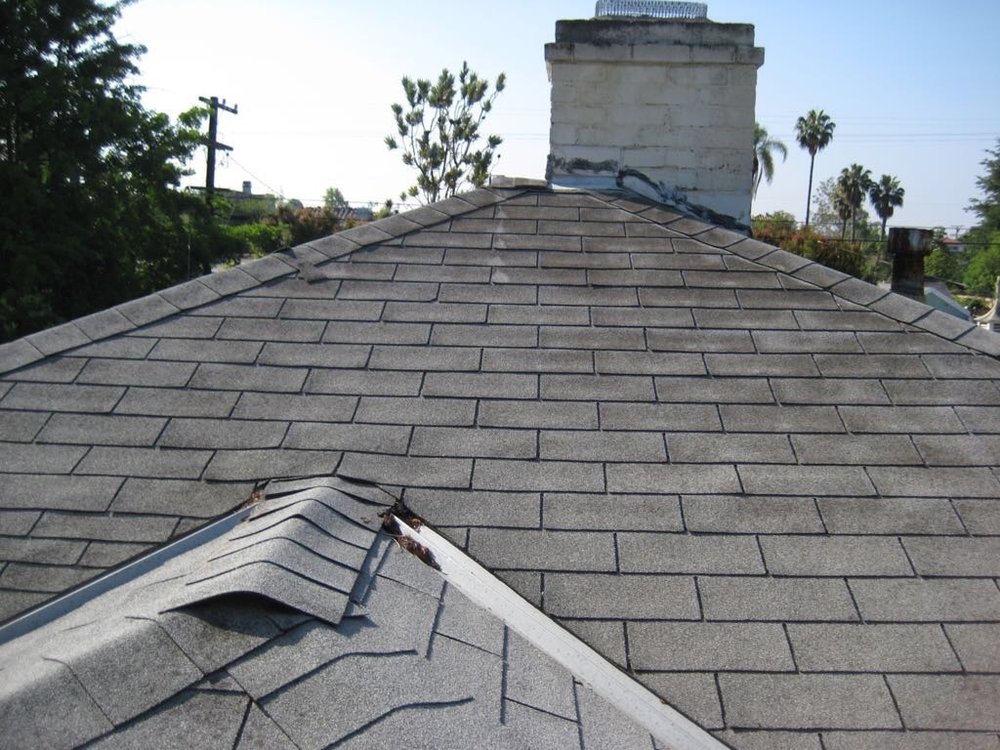 Slide of Top Roofing Contractor