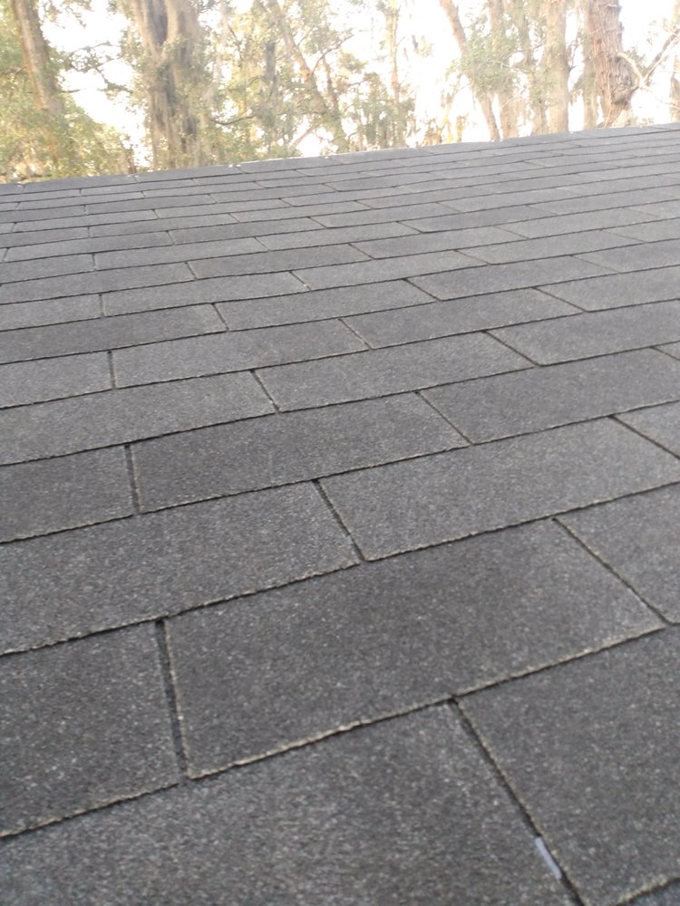 Slide of UnZucky Roofing