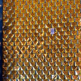 Tin Can Alley - I love this wall, made of the aluminum cans from Santa Fe Brewing - Food Court Near Me - Albuquerque, New Mexico
