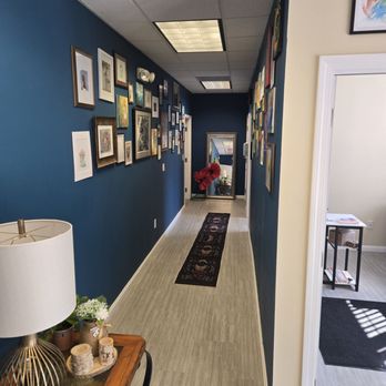 Copper Poppy Studio - Hallway inside displaying art from all the artists here - Tattoo Near Me - Franklin, Connecticut Copper Poppy Studio - Hallway inside displaying art from all the artists here - Tattoo Near Me - Franklin, Connecticut