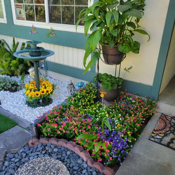 Lemus Landscaping & Excavating - A little pop of color with some artificial flowers - Landscaping Near Me