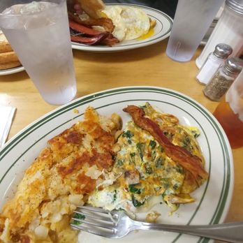 John's Coffee Donut Shop - Spinach, sausage, mozzarella omelette. Home fries. Over there: over easy eggs with beef sausage and bacon. - Diners Near Me - Brooklyn, New York