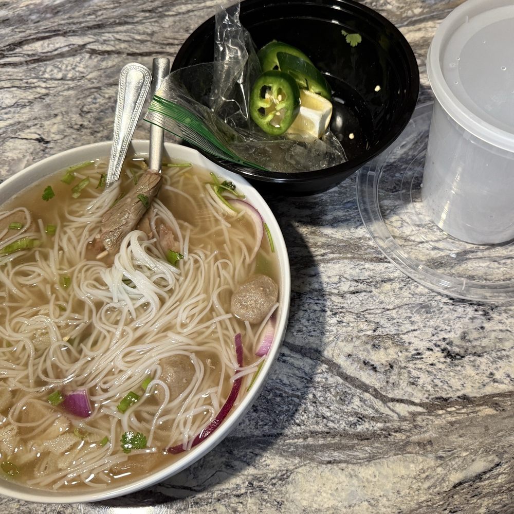 My bowl and utensils taken home and the containers the beef broth pho came in. My bowl and utensils taken home and the containers the beef broth pho came in.