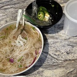 Hunan Chef - My bowl and utensils taken home and the containers the beef broth pho came in.
