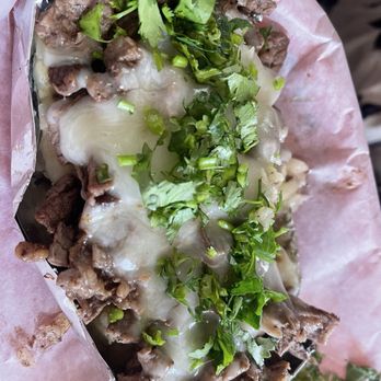 Bullos Place - Asada (beef) potato covered in cheese - Mexican Near Me - Ensenada, BCN Bullos Place - Asada (beef) potato covered in cheese - Mexican Near Me - Ensenada, BCN