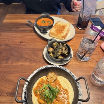 Tupelo Honey - Tupelo's Shrimp & Grits (GF) Grilled Cheese Dip n' Dunk Crispy Brussels* - Breakfast & Brunch Near Me - Raleigh, North Carolina