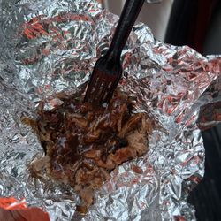 Pig-n-Chik - Chop brisket with barbecue sauce