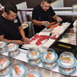 Sushi Master's Eres, Elias, and Rudy preparing for opening day