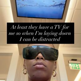 They let me wear these cool shades for the light and they had the TV on for distractions!