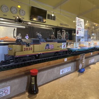 Sushi Train - Sushi train as it rolls around the restaurant. - Sushi Bars Near Me - Tulsa, Oklahoma Sushi Train - Sushi train as it rolls around the restaurant. - Sushi Bars Near Me - Tulsa, Oklahoma