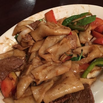 Thai Top Ten - Almost half eaten drunken noodle with flat wide noodle w/beef (mild). asked for extra tomatoes. Big portion, my go-to meal! Dinner $9.75 - Thai Near Me - Richmond, Virginia Thai Top Ten - Almost half eaten drunken noodle with flat wide noodle w/beef (mild). asked for extra tomatoes. Big portion, my go-to meal! Dinner $9.75 - Thai Near Me - Richmond, Virginia