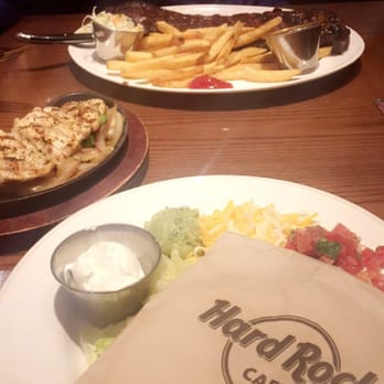 Hard Rock Cafe - Fajitas and ribs. The ribs were dry but the beans were good. The fajitas were really bland. I make them better myself :/ - American Near Me - Pigeon Forge, Tennessee
