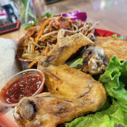 Khao Niew - Lao Street Food - Look at those friend chicken wings!  Yum.