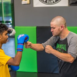 Immortal Martial Arts Center - Warrior Kids Kickboxing