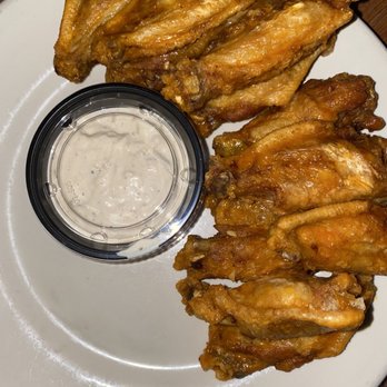 Right Proper Brewing Company - a plate of chicken wings with ranch dip - American Near Me - Washington, DC, District of Columbia