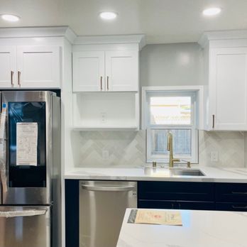 Clever Design & Remodeling - Kitchen wall with new window, fridge, and sink. - General Contractors Near Me - San Jose, California Clever Design & Remodeling - Kitchen wall with new window, fridge, and sink. - General Contractors Near Me - San Jose, California