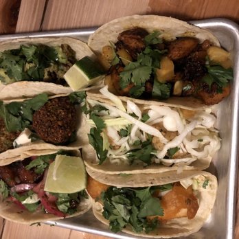 Bartaco Mosaic - (From left to right, too to bottom) Chicken Carnitas, Chicken Pastor, Falafel, Shrimp, Pork Belly, Baja Fish Tacos - Tacos Near Me - Fairfax, Virginia