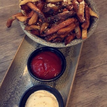 Moku Kitchen - Garlic oil truffle fries - Cocktail Bars Near Me - Honolulu, Hawaii Moku Kitchen - Garlic oil truffle fries - Cocktail Bars Near Me - Honolulu, Hawaii