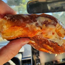 The Original Mart Soft Pretzel Bakery - Pizza pretzel with cheddar jack (saltless pretzel) It's much bigger than it looks in this pic