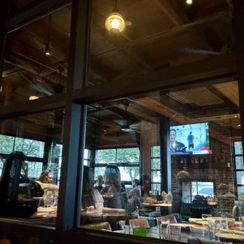 Whiskey Cake Kitchen & Bar - Outdoor seating with fireplace - New American Near Me - Round Rock, Texas Whiskey Cake Kitchen & Bar - Outdoor seating with fireplace - New American Near Me - Round Rock, Texas