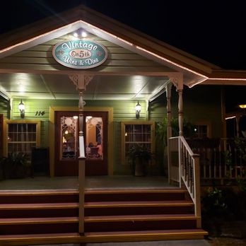 Vintage On 5th - the front of a restaurant at night - New American Near Me - Crystal River, Florida Vintage On 5th - the front of a restaurant at night - New American Near Me - Crystal River, Florida