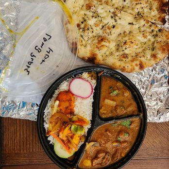 Naan Point - Lunch special take out-Lamp plate with garlic naan and rice.   11 Aug 2023 - Indian Near Me - San Bruno, California
