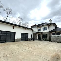 Affordable Garage Doors - Full-view glass garage doors can add a modern twist of sophistication and elegance to your home